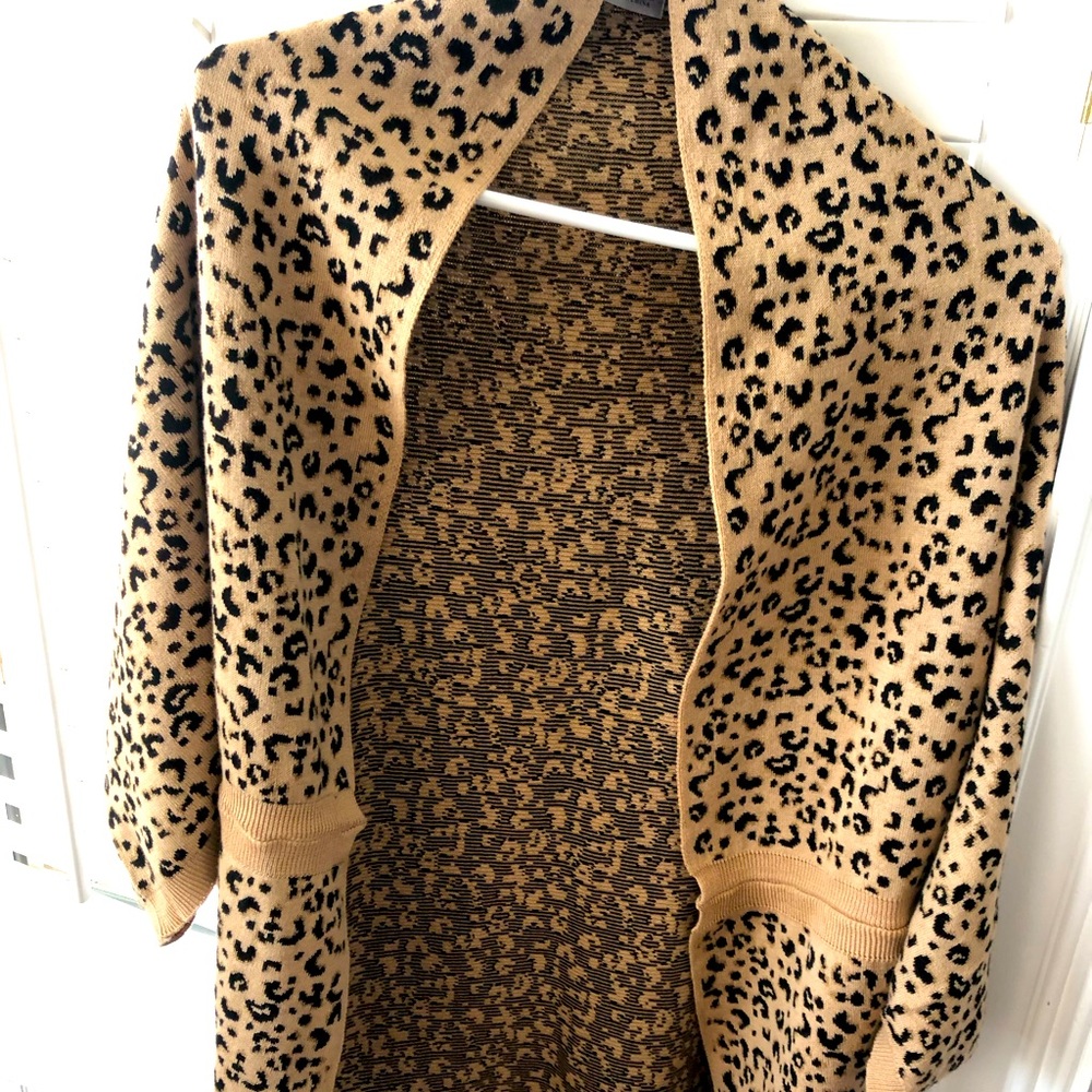 Leopard print versatile shrug , new w /out tags